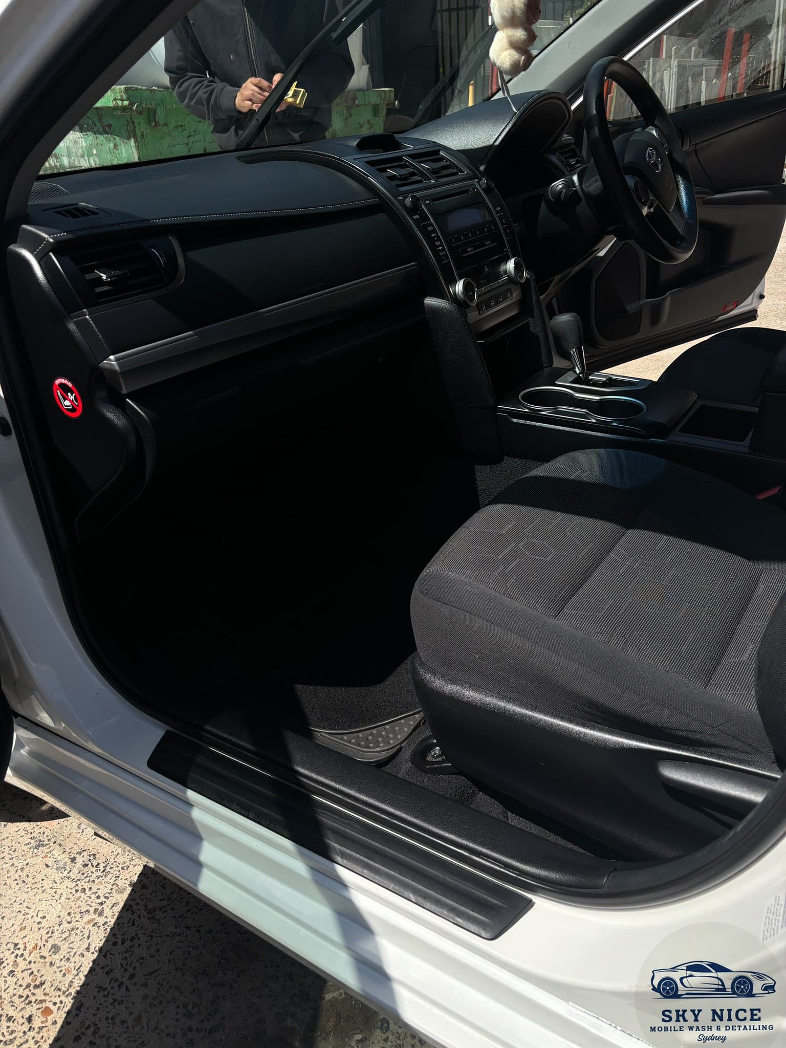 Car undercarriage before detailing